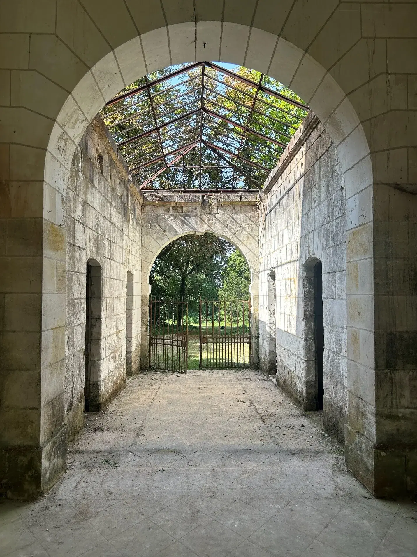 Historic stone passage inside the former stables of Château de Montgoger, one of the sites of MONUMENT’AFRICA.